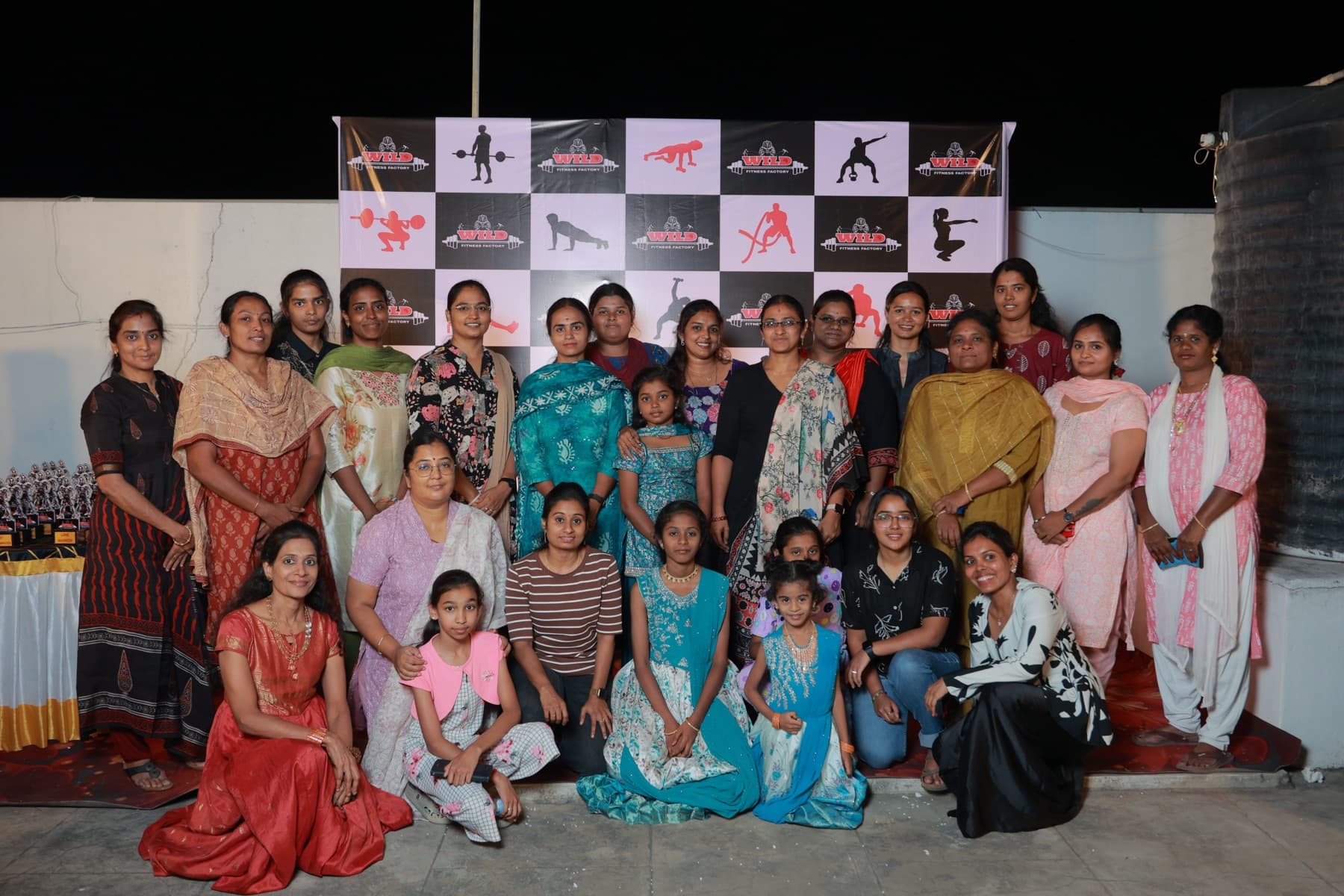 Women at a Wild Fitness Factory community event in Erode