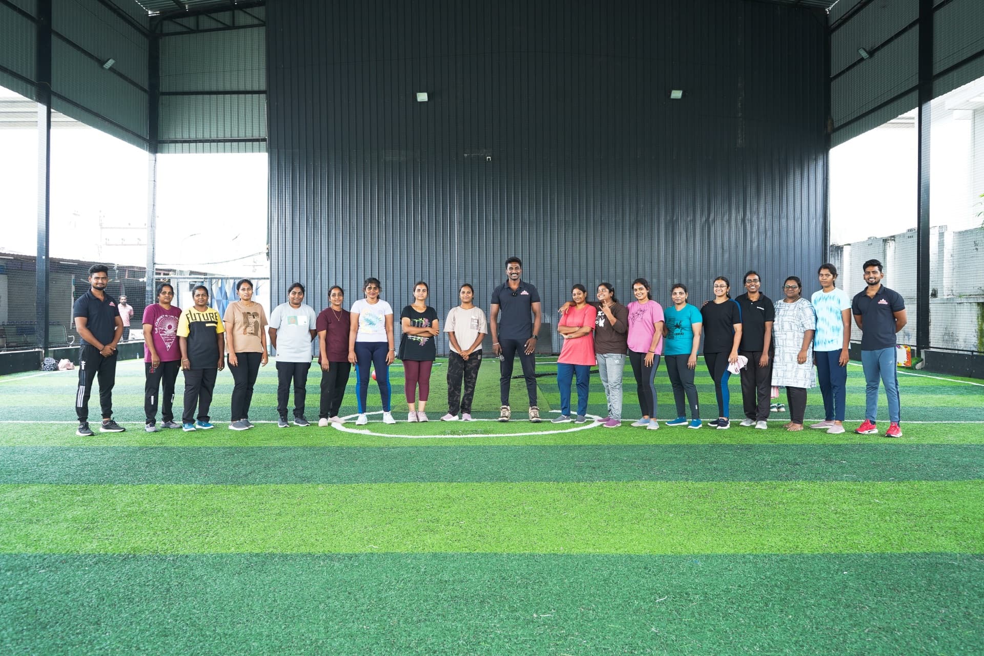 Women participating in a Wild Fitness community turf event in Erode